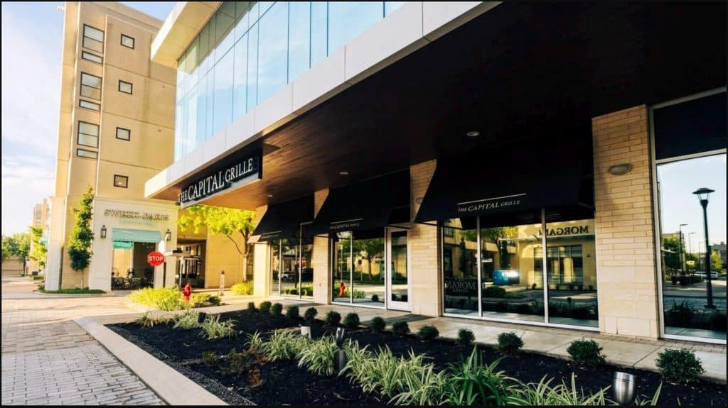 A walkable town-centre street in the Houston area — sidewalk shopfronts, in Memorial City Houston